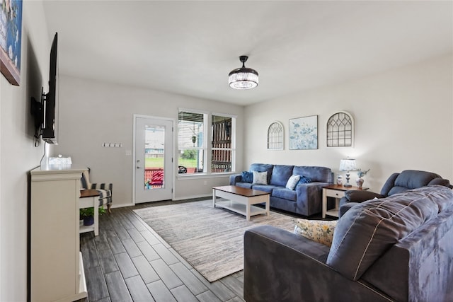 living room with dark wood-type flooring