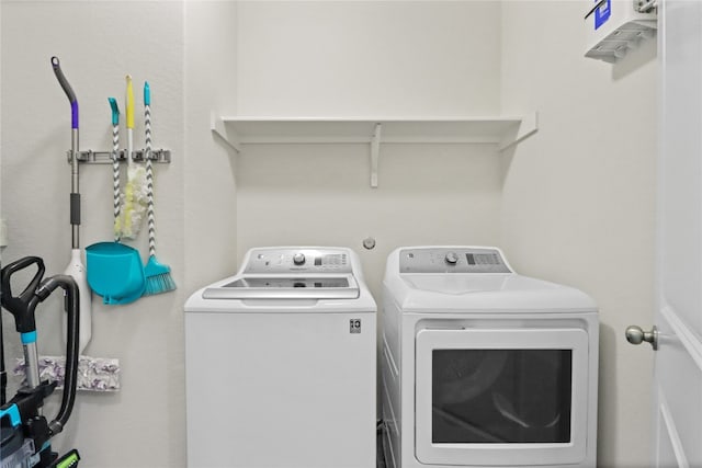 laundry room with separate washer and dryer