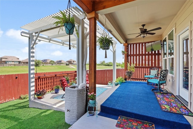 view of patio featuring a pergola and ceiling fan