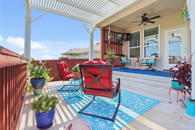 view of patio featuring a pergola and ceiling fan