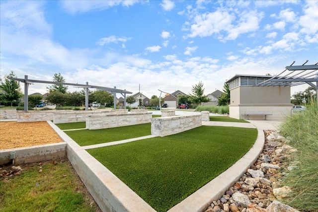 view of yard with a pergola