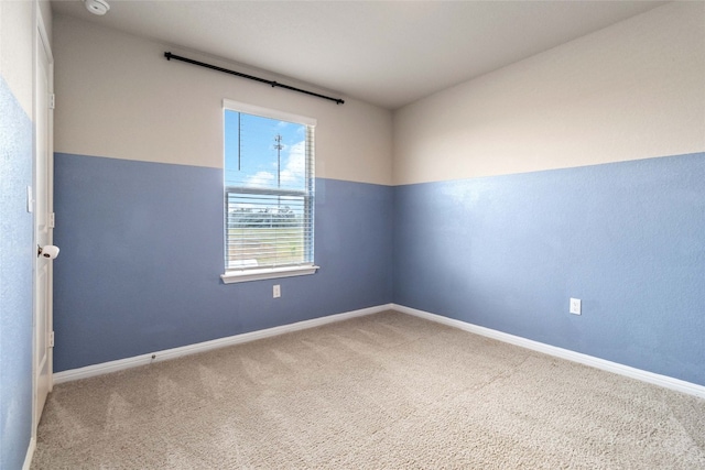 spare room with carpet floors