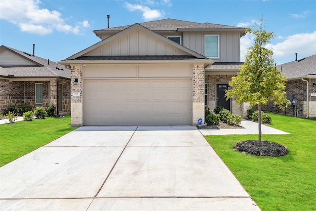 craftsman house featuring a garage and a front lawn