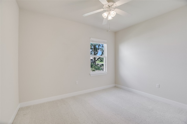 unfurnished room with carpet and ceiling fan