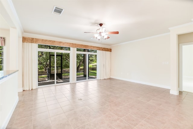 unfurnished room featuring ornamental molding, light tile patterned flooring, a healthy amount of sunlight, and ceiling fan