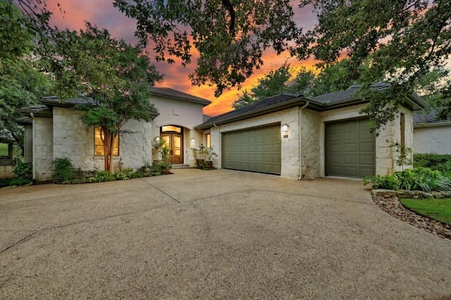 view of front of home with a garage