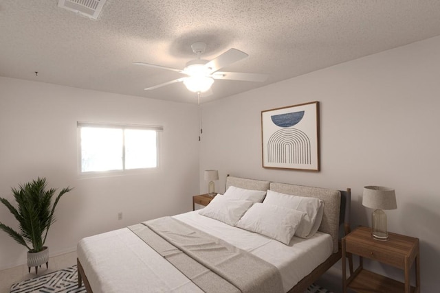 bedroom with a textured ceiling and ceiling fan