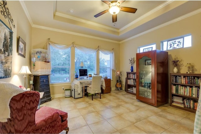 office with a raised ceiling, a wealth of natural light, and crown molding