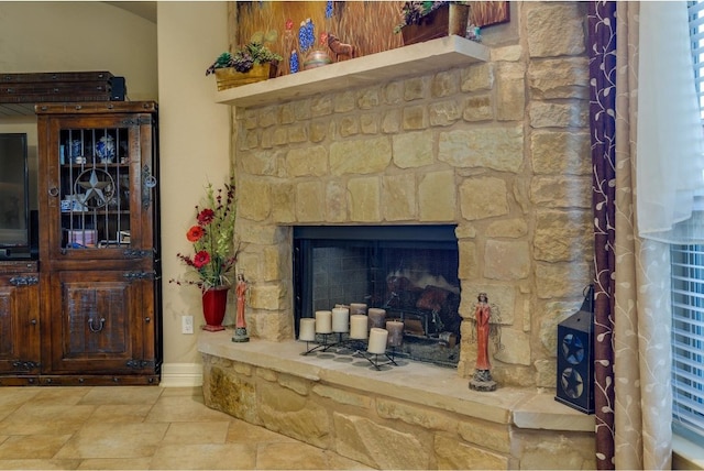 interior details featuring a fireplace