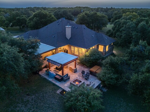 view of aerial view at dusk