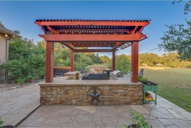 view of patio featuring a pergola, area for grilling, and an outdoor bar