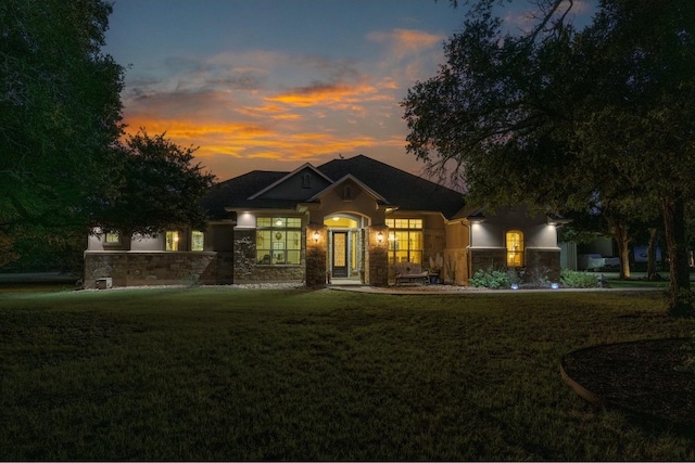 craftsman inspired home with a yard