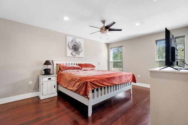 bedroom featuring dark wood-type flooring and ceiling fan