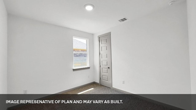 view of carpeted spare room