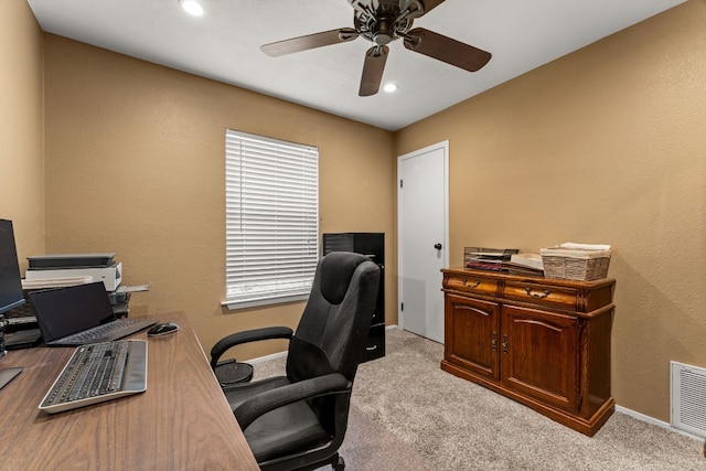 office featuring light colored carpet and ceiling fan