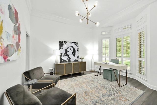 home office featuring dark hardwood / wood-style floors, ornamental molding, and an inviting chandelier