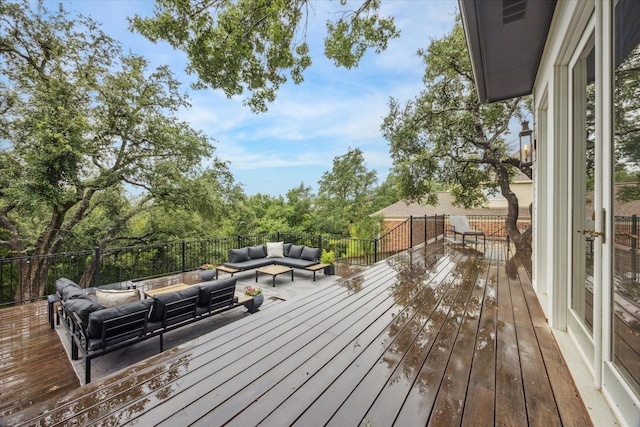 wooden deck with an outdoor hangout area