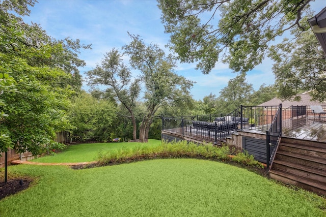 view of yard featuring a wooden deck