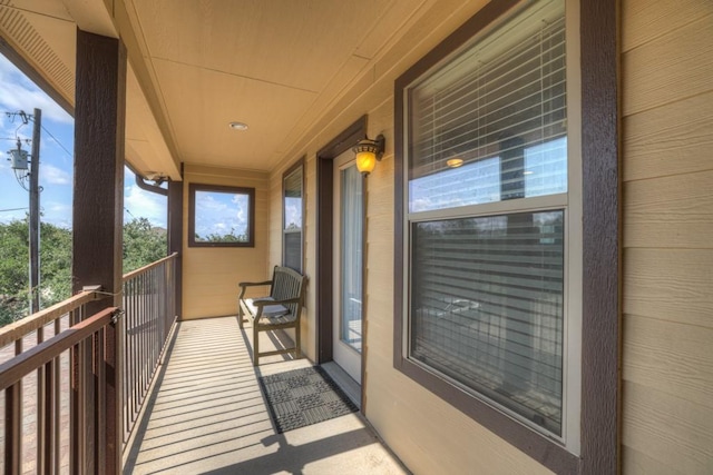 balcony featuring a sunroom