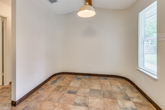 view of tiled spare room