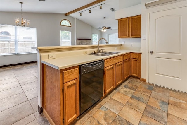 kitchen featuring a wealth of natural light, dishwasher, sink, hanging light fixtures, and kitchen peninsula