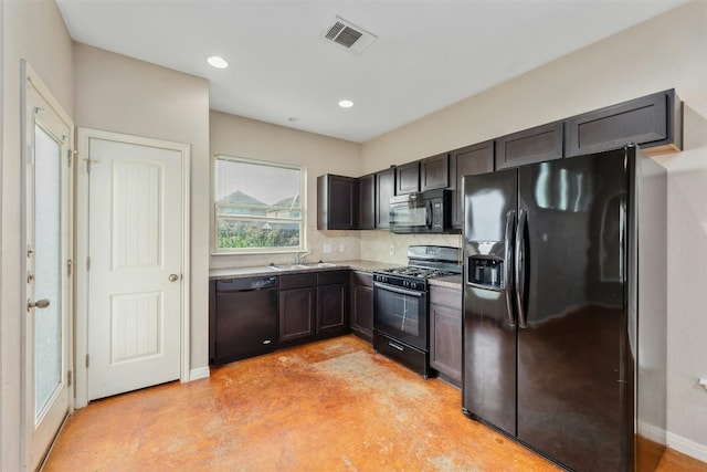 kitchen featuring dark brown cabinetry, sink, decorative backsplash, and black appliances