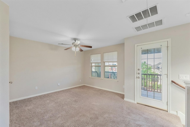 empty room with light carpet and ceiling fan