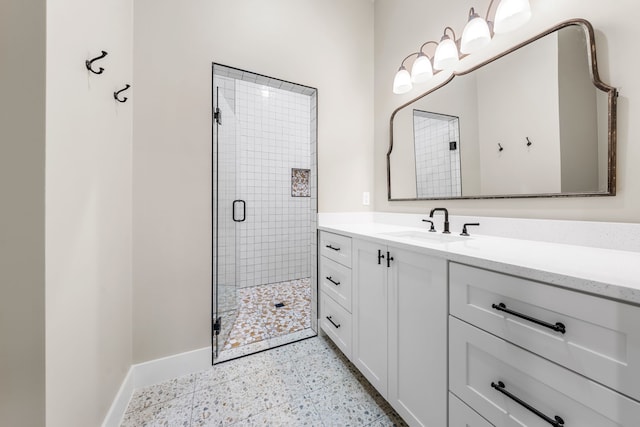 bathroom with vanity and walk in shower