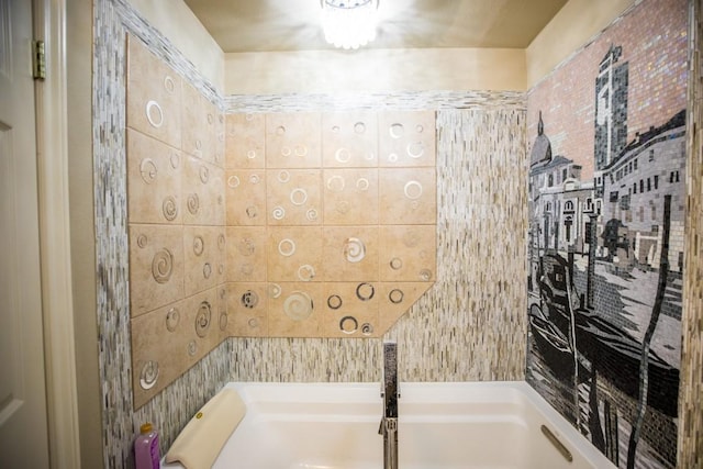 bathroom featuring a tub to relax in