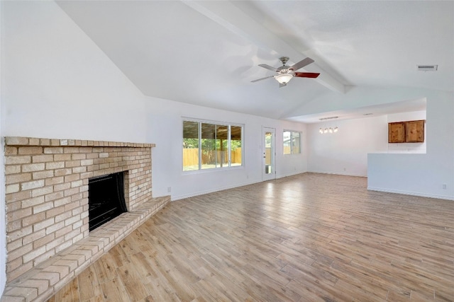 unfurnished living room with vaulted ceiling with beams, a fireplace, ceiling fan, and light wood-type flooring