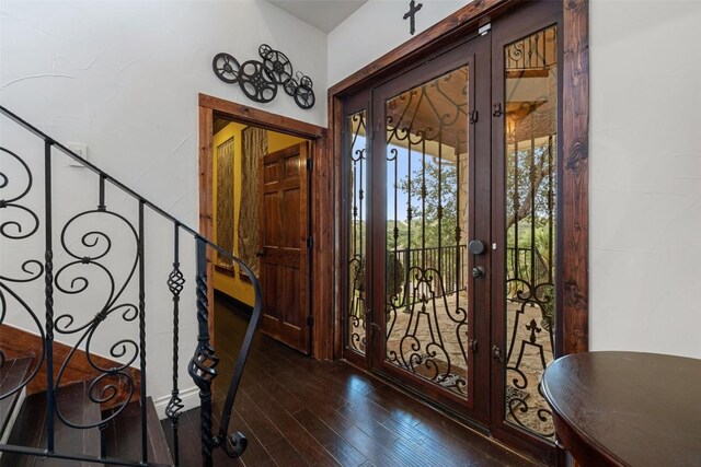 201 Cowal Dr N, Spicewood, TX 78669 - foyer entrance with french doors, dark wood-style flooring, and stairway