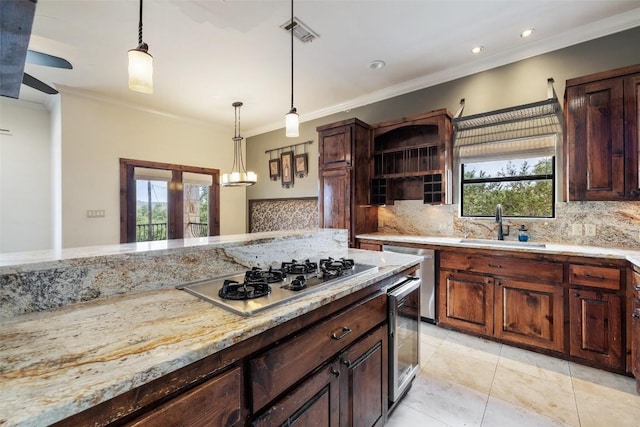 201 Cowal Dr N, Spicewood, TX 78669 - kitchen with stainless steel gas stovetop, a sink, decorative backsplash, open shelves, and ornamental molding