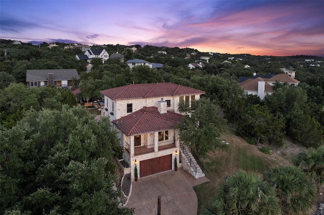 view of aerial view at dusk