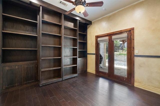 201 Cowal Dr N, Spicewood, TX 78669 - unfurnished room featuring baseboards, dark wood-style flooring, and a ceiling fan