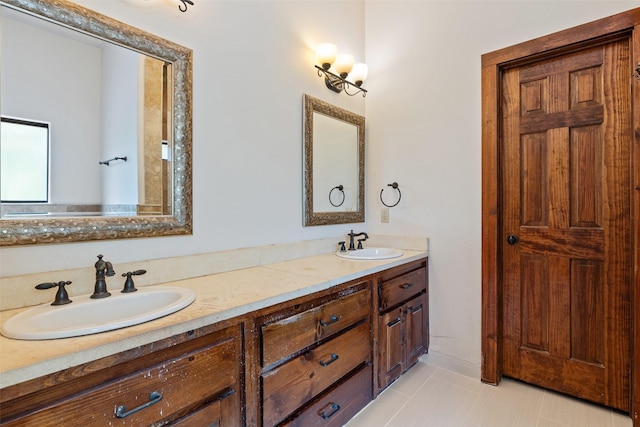 bathroom featuring tile patterned floors and vanity