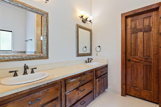 201 Cowal Dr N, Spicewood, TX 78669 - full bathroom featuring double vanity and tile patterned flooring