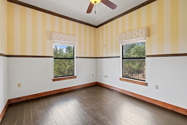 201 Cowal Dr N, Spicewood, TX 78669 - unfurnished room with crown molding, baseboards, wood finished floors, and ceiling fan