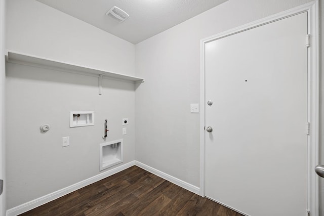 laundry area featuring dark wood-type flooring, gas dryer hookup, hookup for a washing machine, and electric dryer hookup