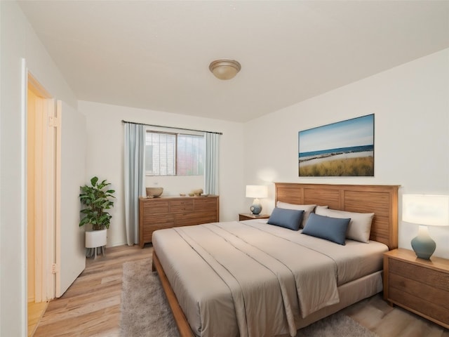 bedroom featuring light wood-type flooring