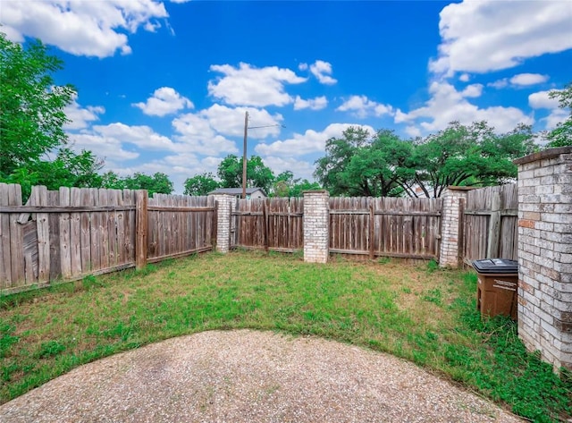 view of yard featuring a fenced backyard