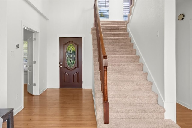 entrance foyer featuring hardwood / wood-style flooring and a wealth of natural light