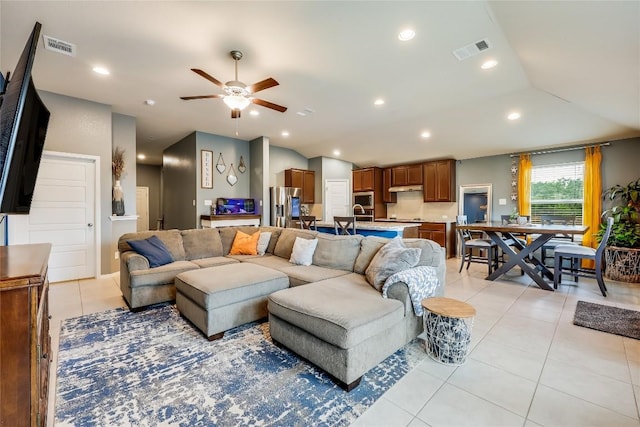 20400 Bear Rd, Lago Vista, TX 78645 - living area featuring light tile patterned floors, ceiling fan, lofted ceiling, and recessed lighting
