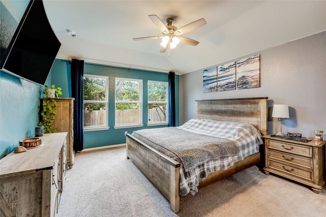 20400 Bear Rd, Lago Vista, TX 78645 - bedroom featuring light colored carpet, a ceiling fan, and baseboards