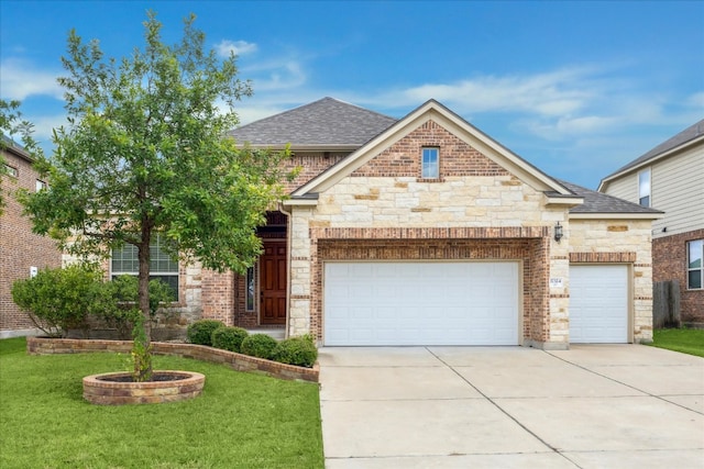 craftsman-style house with a garage and a front yard