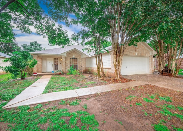 ranch-style house featuring a garage