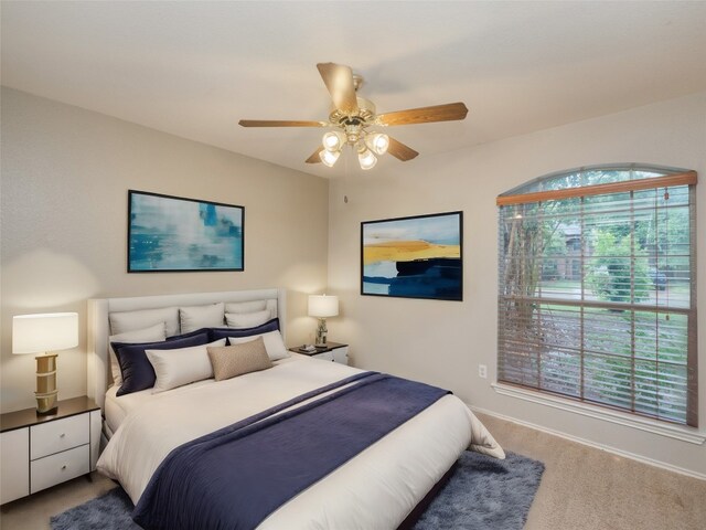 bedroom featuring carpet and ceiling fan