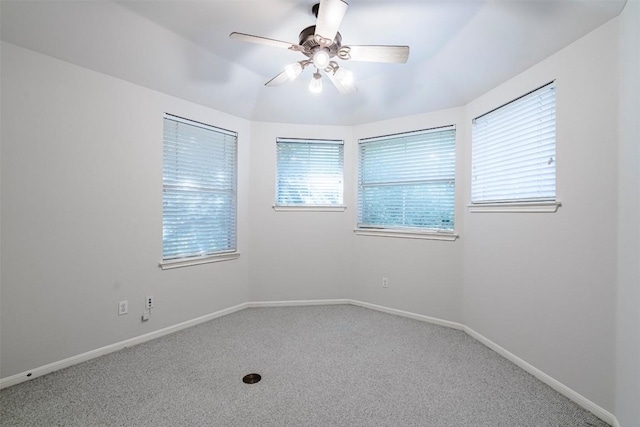 spare room with ceiling fan and carpet flooring