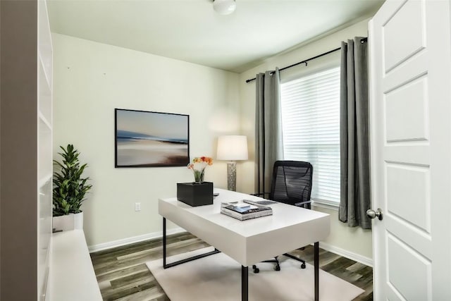 office with hardwood / wood-style flooring