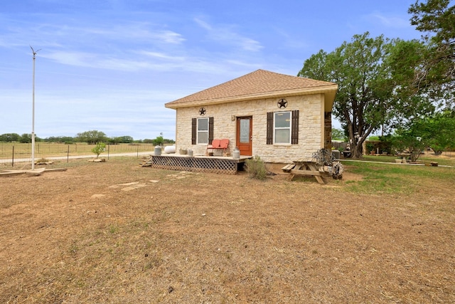 view of front facade featuring a deck