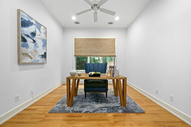 home office featuring ceiling fan and wood-type flooring